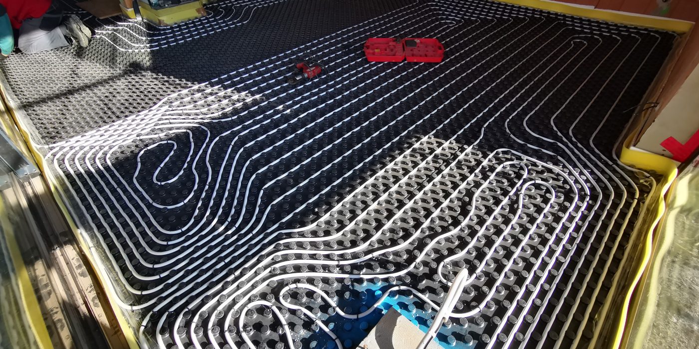 Fotografie rozvodů podlahového vytápění 1NP | Vzorový e4 dům | Wienerberger