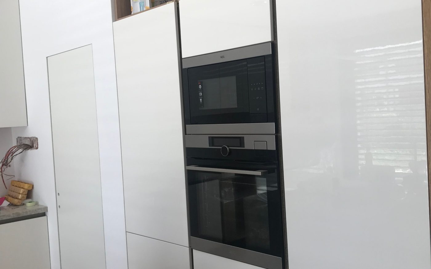 Fotografie - montáž kuchyňské linky a spotřebičů | Wienerberger e4 dům