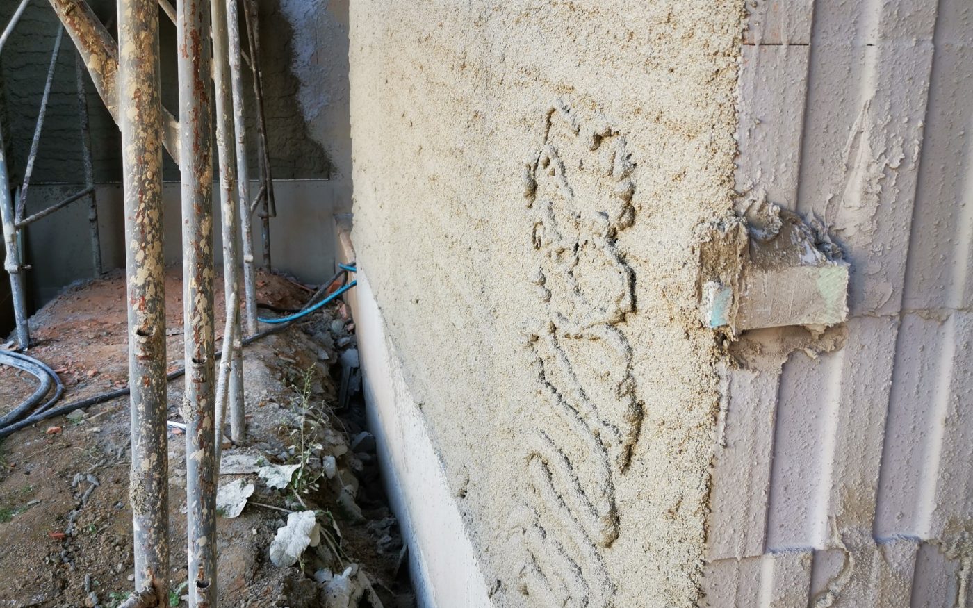 Fotografie první vrstvy omítky | Vzorový e4 dům | Wienerberger