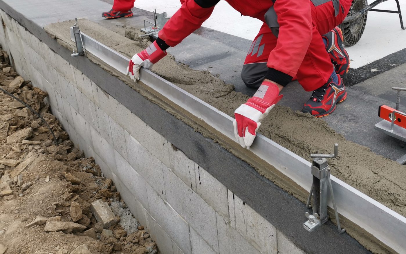 Založení první řady cihel - vzorový e4 dům